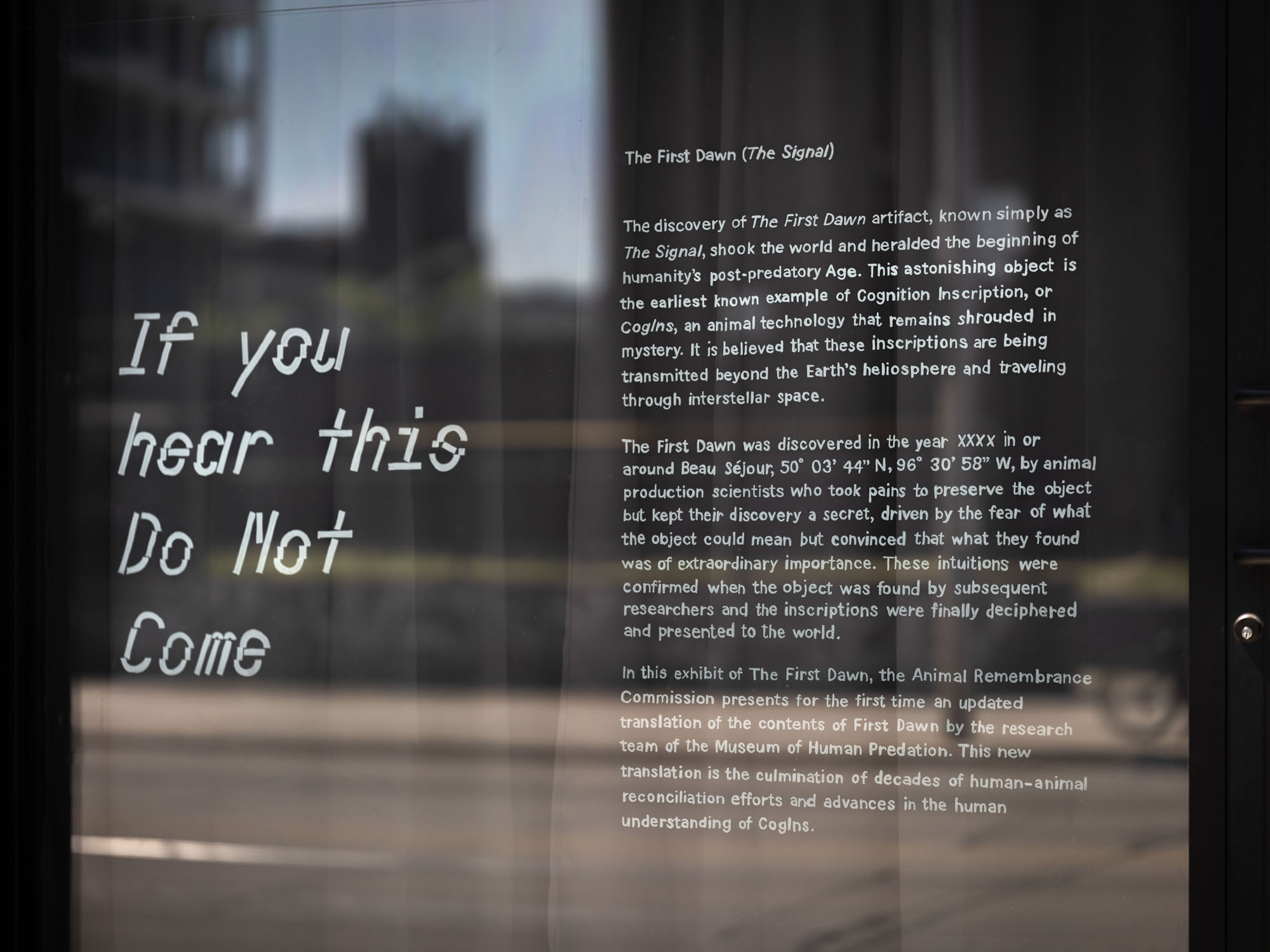 Title and description of the exhibit on gallery window